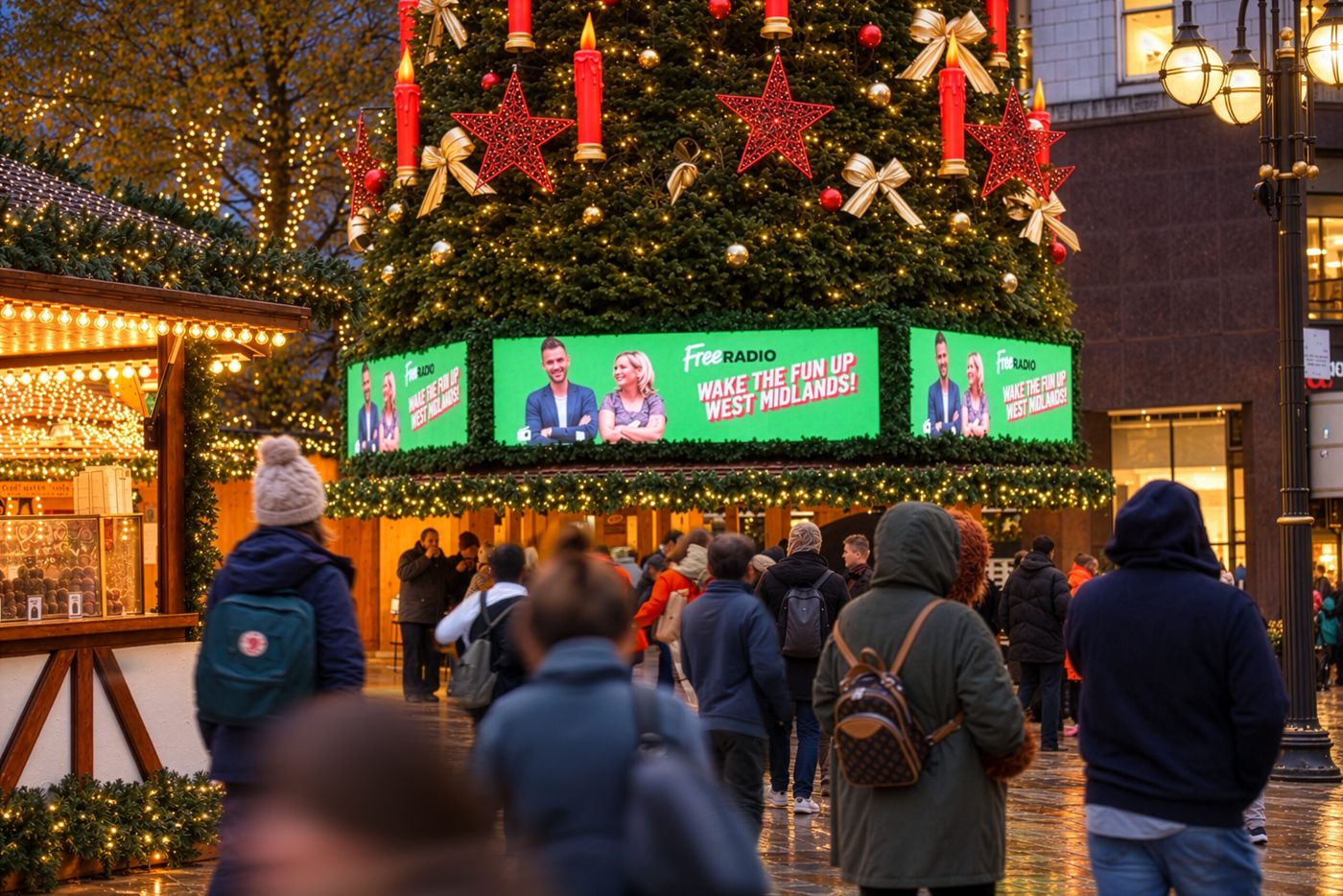 Digital screens at a busy Christmas market